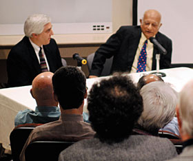 Dr. Steven Novella of Yale University, left, and Dr. Rustum Roy of Penn State, during a debate about homeopathy that was held at the Health Center.