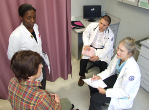 Photo of Dr. Gail Sullivan with a patient