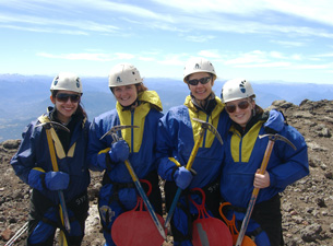 On top of a volcano near Concepcion, Chile are UConn dental students Natalia Sanchez, Kerrie O'Brien, Brittany Sonnichsen, and Jenn Merry. 