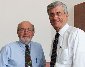 Dr. Robert Greenstein, left, and Dr. Jose Muniz. Greenstein was director of the pediatric residency training program during Muniz’s training.
