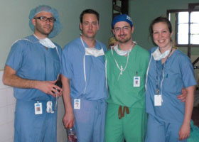 Photo of Dr. Christopher Hughes and members of his surgical team