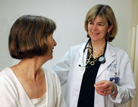 Photo of Dr. Molly Brewer with a patient