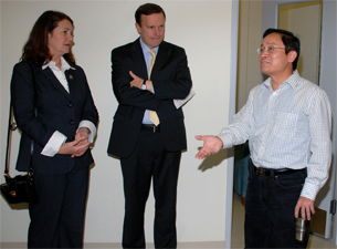 Photo of Diana DeGette, Chris Murphy and Dr. Ren-He Xu