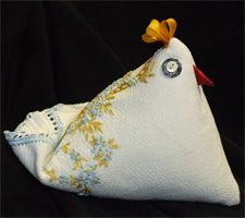 Photo of a hand-made birdie pincushion