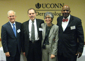 From left: President Mike Hogan, Dr. Barry D. Kels, Dr. Jane Grant Kels, Dr. Cato T. Laurencin.