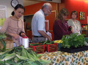 Photo of shoppers at the farmers market