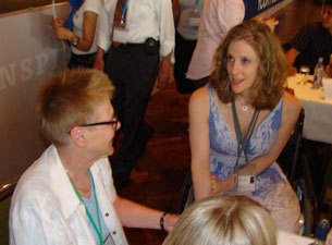 Photo of Jodi Eipper-Mains talking with Dr. Astrid Graslund 