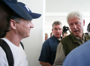 Dr. Robert Fuller talks with former President Bill Clinton