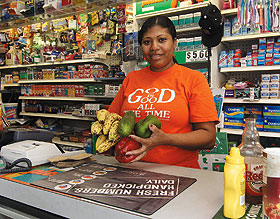 Antonia Helena, owner of Williams Market in Hartford, displays some of the healthy foods available at her store.
