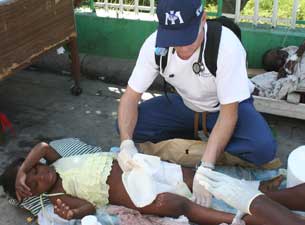 Photo of Dr. Robert Fuller in Port-au-Prince following the Haitian Earthquake in January