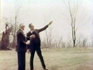 Two men at the O'Meara farm prior to the construction of the UConn Health Center