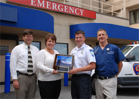 Photo of Dr. Lauri Bolton, Lisa Graziano, Christopher Brewer and Dr. Robert Fuller