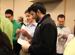 Fourth-year medical students opening their envelopes to find out what residency program theyve been accepted into during Match Day 2011.
