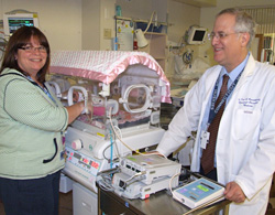 Nurse practitioner Claudia Wittenzellner and Dr. Ted Rosenkrantz evaluating an infant for the Breathing and Reflux Program.