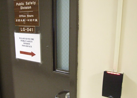 Photo of badge reader outside the Public Safety Division office