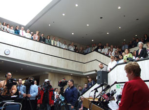 Photo of Governor M. Jodi Rell speaking to the crowd gathered in the academic lobby