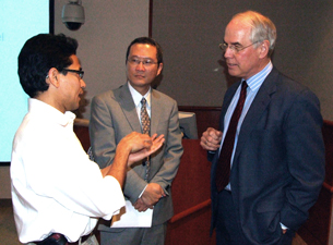 Photo of David Han, Dr. Bruce Liang, and Roger Newton