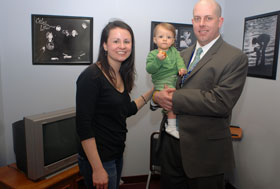 From left, Diana, Caroline, and Eric Baim at the dedication of the Family Resource Room in the Health Center’s Neonatal Intensive Care Unit (NICU), where Caroline started her life.